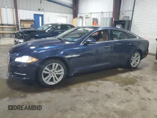 2013 Jaguar XJ with VIN SAJWJ1CD9D8V48115, listed as a Copart auction lot 69420873 with 76,479 mi miles and Salvage Title. Bid and sale history available at carsss.com. Image 1.