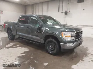 2021 Ford F-150 XL with VIN 1FTFW1E59MKD82204, listed as a IAAI auction lot 41466186 with 56,839 mi miles. Bid and sale history available at carsss.com. Image 1.
