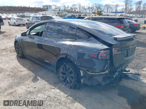2023 Tesla Model X with VIN 7SAXCDE52PF425834, listed as a IAAI auction lot 41996298 with Not Provided miles and . Bid and sale history available at DreamBid. Image 3.