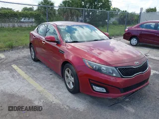 2015 Kia Optima LX z VIN 5XXGM4A75FG361463, wystawiony jako IAAI lot #42340552 z przebiegiem 202 259 mil mil oraz . Historia ofert i sprzedaży dostępna na DreamBid. Obrazek 1.