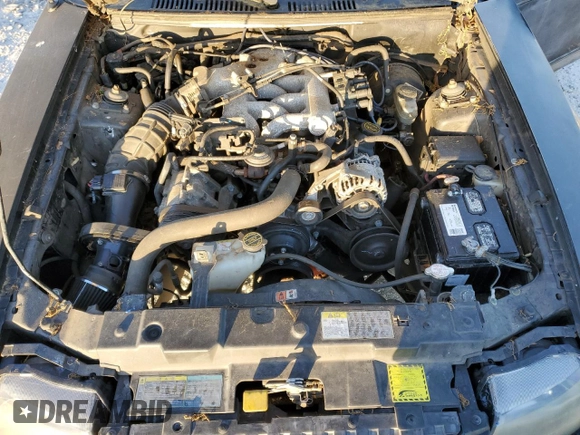 2004 Ford Mustang Deluxe z VIN 1FAFP44654F143868, wystawiony jako Copart lot #52991535 z przebiegiem 167 015 mil mil oraz Czysty tytuł • Clean title. Historia ofert i sprzedaży dostępna na DreamBid. Obrazek 11.
