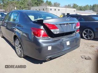2011 Toyota Avalon with VIN 4T1BK3DBXBU381959, listed as a IAAI auction lot 42029923 with 150,028 mi miles and . Bid and sale history available at carsss.com. Image 6.
