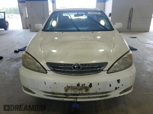 2004 Toyota Camry LE with VIN JTDBE32K940245895, listed as a Copart auction lot 63064585 with 197,467 mi miles and Clean title. Bid and sale history available at DreamBid. Image 5.