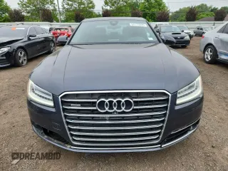 2015 Audi A8 4.0T with VIN WAUJ2AFD6FN011009, listed as a Copart auction lot 64173005 with 153,377 mi miles and Salvage title. Bid and sale history available at DreamBid. Image 5.