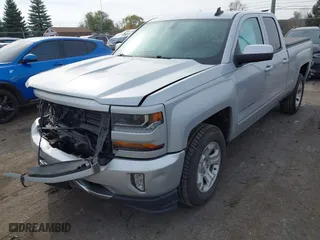 2018 Chevrolet Silverado 1500 LT with VIN 1GCVKREH9JZ362330, listed as a IAAI auction lot 40738418 with 77,814 mi miles. Bid and sale history available at carsss.com. Image 2.