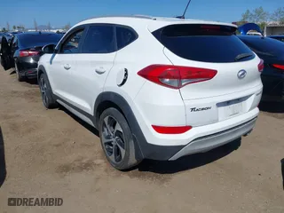 2017 Hyundai Tucson Value with VIN KM8J33A27HU438902, listed as a IAAI auction lot 41835502 with 84,885 mi miles. Bid and sale history available at carsss.com. Image 3.