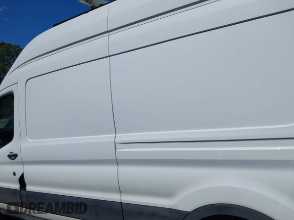 2020 Ford Transit Cargo with VIN 1FTBR1X86LKB19969, listed as a IAAI auction lot 41844157 with 182,881 mi miles and . Bid and sale history available at DreamBid. Image 14.