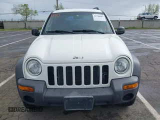 2002 Jeep Liberty Sport with VIN 1J4GL48K92W268896, listed as a IAAI auction lot 41915144 with 102,706 mi miles. Bid and sale history available at carsss.com. Image 6.