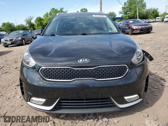 2017 Kia Niro Touring with VIN KNDCE3LC4H5072016, listed as a Copart auction lot 58342094 with 83,163 mi miles and Salvage Title. Bid and sale history available at carsss.com. Image 5.