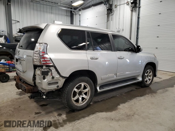 2014 Lexus GX 460 Luxury z VIN JTJJM7FX2E5069205, wystawiony jako Copart lot #89219335 z przebiegiem 154 878 mil mil oraz Szkody całkowita. Historia ofert i sprzedaży dostępna na DreamBid. Obrazek 3.