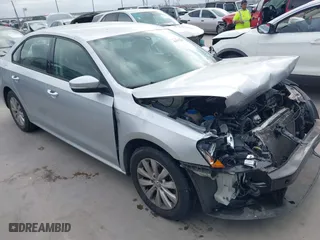 2015 Volkswagen Passat 1.8T Limited Edition with VIN 1VWAT7A30FC002932, listed as a IAAI auction lot 41777501 with 127,979 mi miles. Bid and sale history available at carsss.com. Image 1.