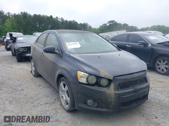 2016 Chevrolet Sonic LTZ z VIN 1G1JE5SB7G4156694, wystawiony jako IAAI lot #42157696 z przebiegiem 154 337 mil mil oraz . Historia ofert i sprzedaży dostępna na DreamBid. Obrazek 1.