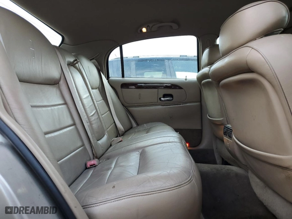 2001 Lincoln Town Car Executive with VIN 1LNHM81W81Y700002, listed as a Copart auction lot 47018365 with 129,456 mi miles and Salvage Title. Bid and sale history available at carsss.com. Image 10.
