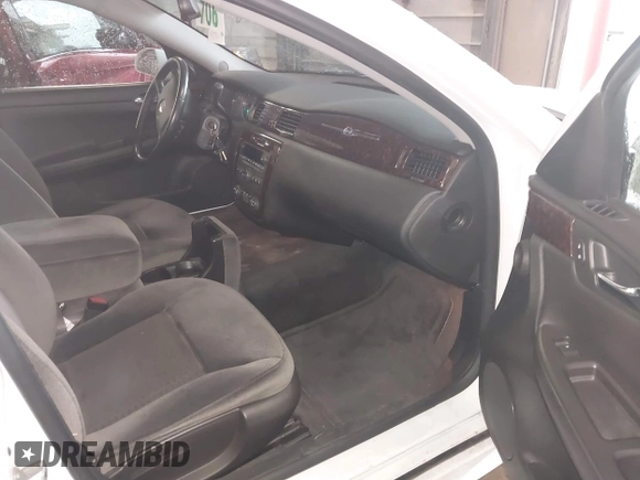 2013 Chevrolet Impala LT with VIN 2G1WB5E31D1164929, listed as a IAAI auction lot 42091934 with 67,218 mi miles and . Bid and sale history available at DreamBid. Image 5.