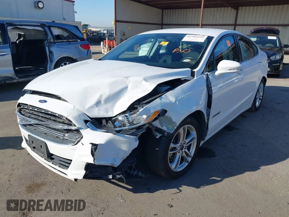 2015 Ford Fusion SE Hybrid with VIN 3FA6P0LU3FR249444, listed as a IAAI auction lot 41602659 with 145,024 mi miles. Bid and sale history available at carsss.com. Image 6.