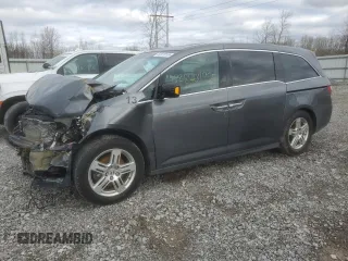 2012 Honda Odyssey Touring with VIN 5FNRL5H90CB069422, listed as a Copart auction lot 52870195 with 0 mi miles and Salvage Title. Bid and sale history available at carsss.com. Image 1.