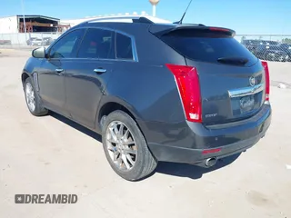 2013 Cadillac SRX Performance Collection with VIN 3GYFNDE38DS568561, listed as a IAAI auction lot 41701063 with 139,191 mi miles. Bid and sale history available at carsss.com. Image 3.