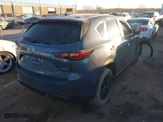 2023 Mazda CX-5 2.5 S Carbon Edition with VIN JM3KFBCM5P0242057, listed as a IAAI auction lot 41346204 with 1 mi miles. Bid and sale history available at carsss.com. Image 4.