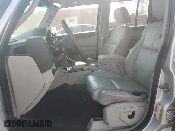 2007 Jeep Commander Limited with VIN 1J8HG58P87C595890, listed as a Copart auction lot 71123654 with 148,438 mi miles and Salvage Title. Bid and sale history available at carsss.com. Image 7.