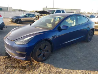 2022 Tesla Model 3 with VIN 5YJ3E1EA3NF190553, listed as a IAAI auction lot 41760731 with 90,268 mi miles. Bid and sale history available at carsss.com. Image 17.