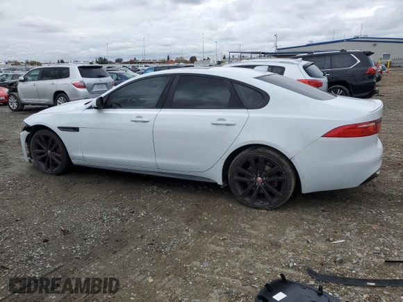 2016 Jaguar XF S with VIN SAJBG4BV0GCY12865, listed as a Copart auction lot 82605274 with 96,787 mi miles and Salvage Title. Bid and sale history available at carsss.com. Image 2.