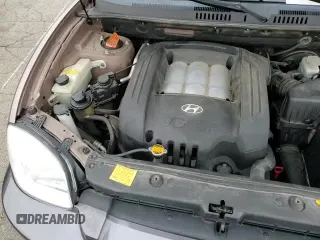 2005 Hyundai Santa Fe GLS с VIN KM8SC73DX5U975009, выставлен на аукционе Copart как лот 82798014 с пробегом 192 287 миль миль и Списание • Salvage title. История ставок и продаж доступна на DreamBid. Изображение 14.