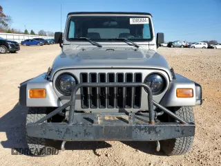 2001 Jeep Wrangler SE with VIN 1J4FA29P11P334902, listed as a Copart auction lot 83883654 with 157,827 mi miles and Salvage Title. Bid and sale history available at carsss.com. Image 5.