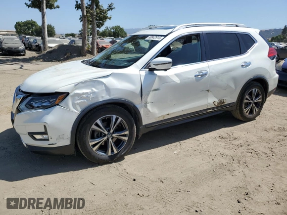 2017 Nissan Rogue SL with VIN 5N1AT2MT3HC751952, listed as a Copart auction lot 60842915 with 75,606 mi miles and Salvage title. Bid and sale history available at DreamBid. Image 1.
