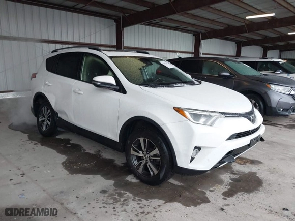 2018 Toyota RAV4 XLE with VIN JTMRFREV6JD222115, listed as a IAAI auction lot 41505367 with 118,126 mi miles. Bid and sale history available at carsss.com. Image 1.