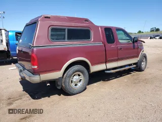 1999 Ford F-150 XL z VIN 1FTRX18LXXNB23891, wystawiony jako Copart lot #61445645 z przebiegiem 179 410 mil mil oraz Szkoda całkowita • Salvage title. Historia ofert i sprzedaży dostępna na DreamBid. Obrazek 3.