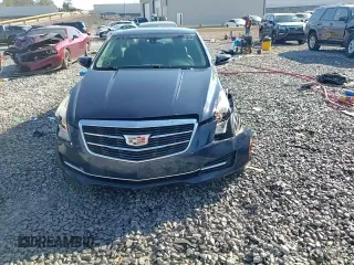 2015 Cadillac ATS Standard AWD z VIN 1G6AG1RX2F0121274, wystawiony jako Copart lot #48011165 z przebiegiem 111 579 mil mil oraz Szkoda całkowita • Salvage title. Historia ofert i sprzedaży dostępna na DreamBid. Obrazek 13.