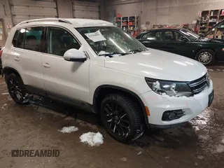 2012 Volkswagen Tiguan SE z VIN WVGBV7AX2CW553244, wystawiony jako IAAI lot #41556004 z przebiegiem 150 770 mil mil oraz . Historia ofert i sprzedaży dostępna na DreamBid. Obrazek 1.