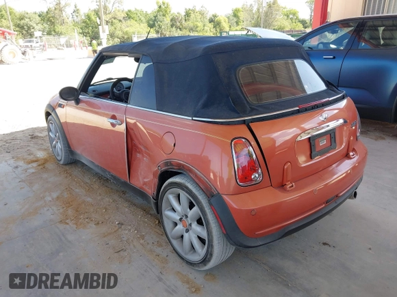 2005 MINI Convertible with VIN WMWRF334X5TF61026, listed as a IAAI auction lot 42125720 with 117,908 mi miles and . Bid and sale history available at DreamBid. Image 3.