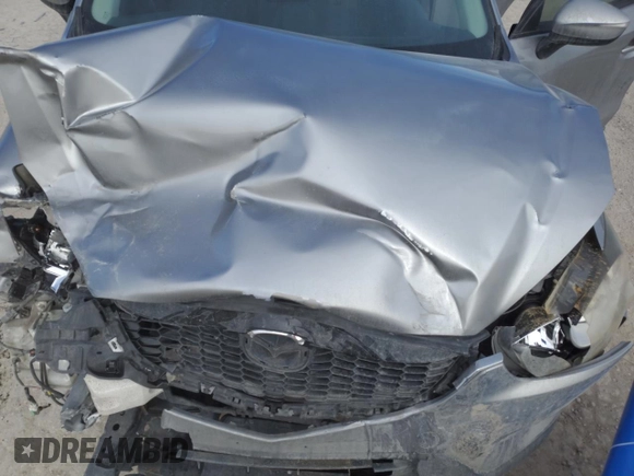 2015 Mazda CX-5 Touring with VIN JM3KE4CY4F0467571, listed as a Copart auction lot 88919035 with 197,755 mi miles and Salvage Title. Bid and sale history available at carsss.com. Image 14.