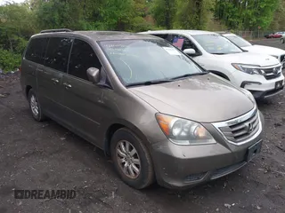 2009 Honda Odyssey EX-L with VIN 5FNRL38759B022866, listed as a IAAI auction lot 42200965 with 145,641 mi miles and . Bid and sale history available at DreamBid. Image 6.