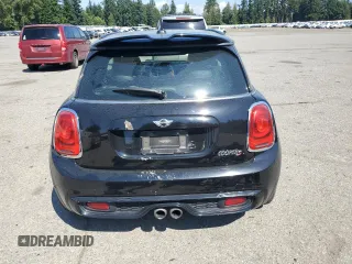 2016 MINI Hardtop S with VIN WMWXP7C5XG3B33500, listed as a Copart auction lot 65537105 with 114,984 mi miles and Salvage title. Bid and sale history available at DreamBid. Image 6.