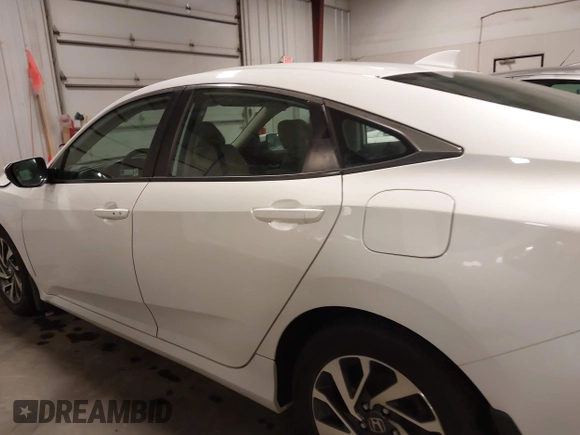 2018 Honda Civic EX with VIN 19XFC2F74JE005647, listed as a IAAI auction lot 41938607 with 90,263 mi miles and . Bid and sale history available at DreamBid. Image 15.