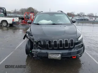 2016 Jeep Cherokee Trailhawk with VIN 1C4PJMBS5GW304062, listed as a IAAI auction lot 41756813 with 112,671 mi miles. Bid and sale history available at carsss.com. Image 13.
