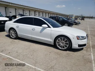 2015 Audi A8 3.0T with VIN WAU3GAFD1FN000655, listed as a Copart auction lot 52792305 with 133,387 mi miles and Salvage Title. Bid and sale history available at DreamBid. Image 4.