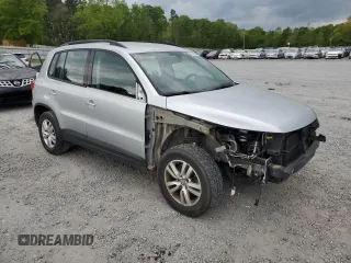 2017 Volkswagen Tiguan S with VIN WVGAV7AX9HK002092, listed as a Copart auction lot 52210695 with 113,791 mi miles and Salvage Title. Bid and sale history available at DreamBid. Image 4.