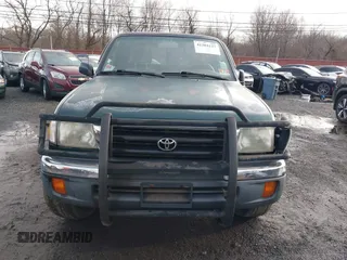 1999 Toyota Tacoma PreRunner with VIN 4TASM92N5XZ492956, listed as a IAAI auction lot 41204127 with 143,627 mi miles and . Bid and sale history available at DreamBid. Image 12.