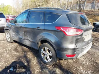 2015 Ford Escape SE with VIN 1FMCU9GX6FUB35649, listed as a IAAI auction lot 42055398 with 128,524 mi miles. Bid and sale history available at carsss.com. Image 3.