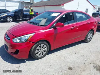 2015 Hyundai Accent GLS with VIN KMHCT4AE1FU801913, listed as a IAAI auction lot 42035825 with 104,701 mi miles. Bid and sale history available at carsss.com. Image 2.