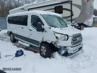 2018 Ford Transit Wagon XL with VIN 1FBZX2ZG2JKB04207, listed as a IAAI auction lot 41440996 with 126,256 mi miles. Bid and sale history available at carsss.com. Image 1.