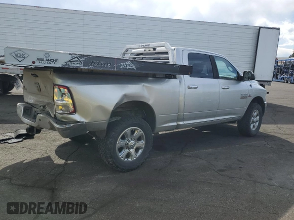 2014 Ram 2500 Big Horn with VIN 3C6UR5DL7EG141473, listed as a Copart auction lot 54074015 with 140,440 mi miles and Salvage title. Bid and sale history available at DreamBid. Image 3.