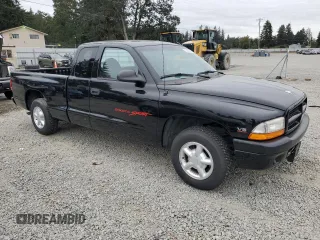 1999 Dodge Dakota SLT with VIN 1B7GL22X3XS314364, listed as a Copart auction lot 70833524 with 51,221 mi miles and Salvage Title. Bid and sale history available at carsss.com. Image 4.