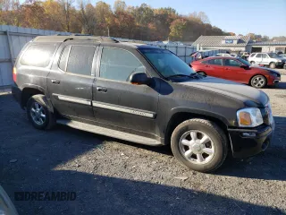 2004 GMC Envoy SLT with VIN 1GKET16S446131726, listed as a Copart auction lot 76033954 with Not Provided miles and Salvage Title. Bid and sale history available at DreamBid. Image 4.