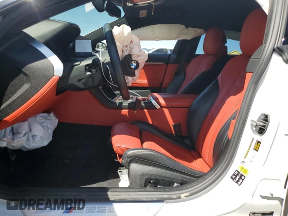 2023 BMW 8 Series M850i z VIN WBAGV8C0XPCK39846, wystawiony jako Copart lot #61173594 z przebiegiem Nie podano mil oraz Szkoda całkowita • Salvage title. Historia ofert i sprzedaży dostępna na DreamBid. Obrazek 7.