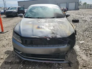 2016 Volkswagen Passat S z VIN 1VWAT7A34GC006015, wystawiony jako Copart lot #58589475 z przebiegiem Nie podano mil oraz Nie do naprawy • Non repairable. Historia ofert i sprzedaży dostępna na DreamBid. Obrazek 5.