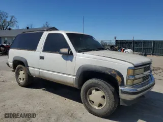 1999 Chevrolet Tahoe with VIN 3GNEK18R4XG171744, listed as a Copart auction lot 50160915 with 209,175 mi miles and Salvage Title. Bid and sale history available at carsss.com. Image 4.